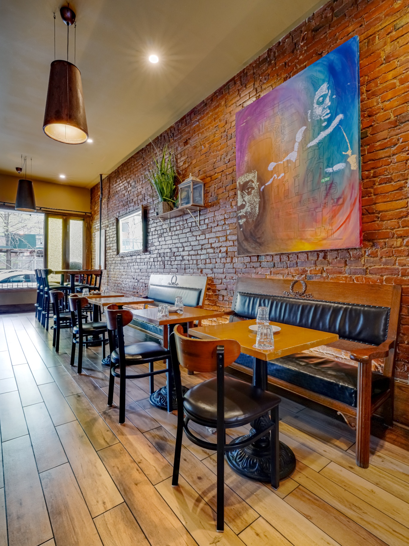Brick wall dining room at Rustik Tavern