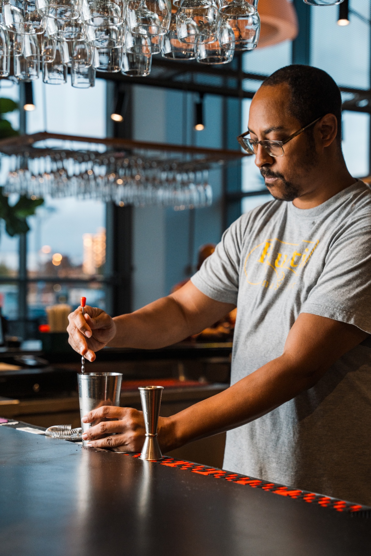 Bartender making drinks at Rustik Tavern